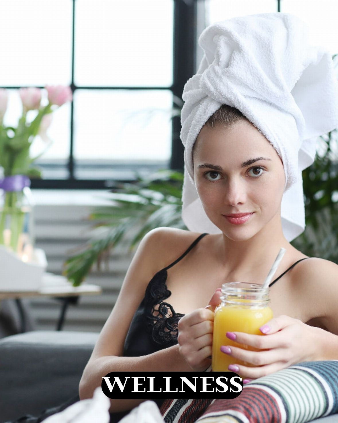 a-woman-with-a-white-veil-on-the-head-handling-a-yellow-glass-of-juice